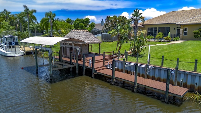 401 SE Verada Ave, Port Saint Lucie, FL 34983 - dock area featuring a water view and boat lift