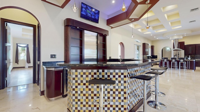 401 SE Verada Ave, Port Saint Lucie, FL 34983 - bar with coffered ceiling, beam ceiling, recessed lighting, and stainless steel fridge