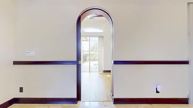 401 SE Verada Ave, Port Saint Lucie, FL 34983 - spare room featuring baseboards and arched walkways
