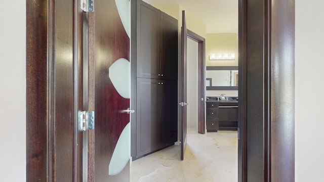 401 SE Verada Ave, Port Saint Lucie, FL 34983 - hallway featuring light marble finish floors