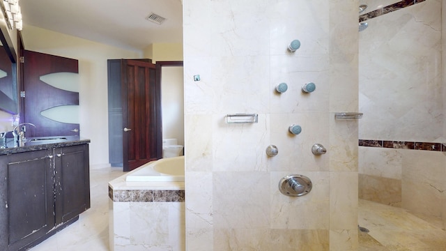 401 SE Verada Ave, Port Saint Lucie, FL 34983 - bathroom with vanity, a garden tub, and tiled shower