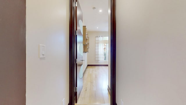 401 SE Verada Ave, Port Saint Lucie, FL 34983 - hall featuring light wood-type flooring, recessed lighting, and baseboards