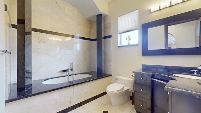 401 SE Verada Ave, Port Saint Lucie, FL 34983 - full bathroom with marble tiled floors, a tub with marble appearance, toilet, and vanity