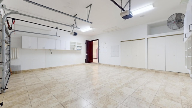 401 SE Verada Ave, Port Saint Lucie, FL 34983 - garage featuring a garage door opener