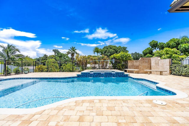 401 SE Verada Ave, Port Saint Lucie, FL 34983 - view of pool with a pool with connected hot tub and a patio