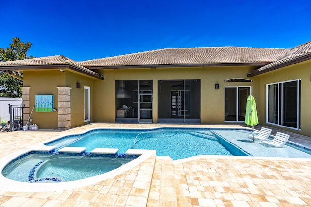 401 SE Verada Ave, Port Saint Lucie, FL 34983 - view of pool with a patio area and a pool with connected hot tub