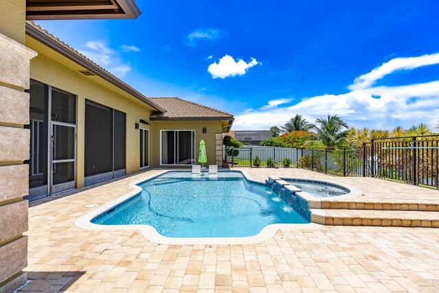401 SE Verada Ave, Port Saint Lucie, FL 34983 - view of pool with a patio and a pool with connected hot tub