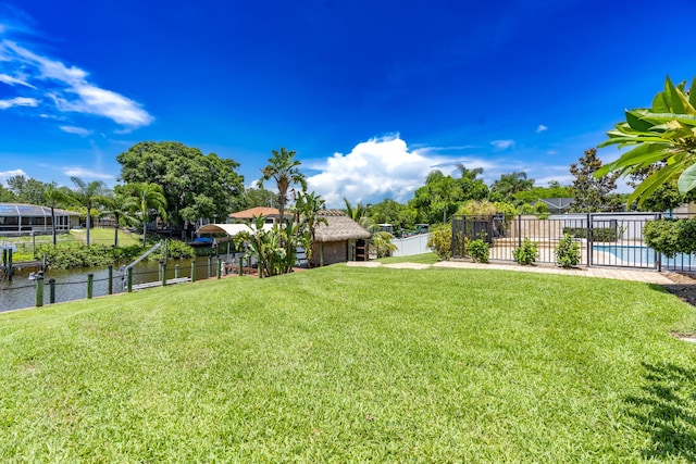 401 SE Verada Ave, Port Saint Lucie, FL 34983 - view of yard featuring a water view