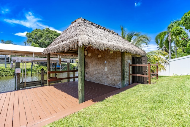 401 SE Verada Ave, Port Saint Lucie, FL 34983 - dock featuring a water view, boat lift, and a gazebo