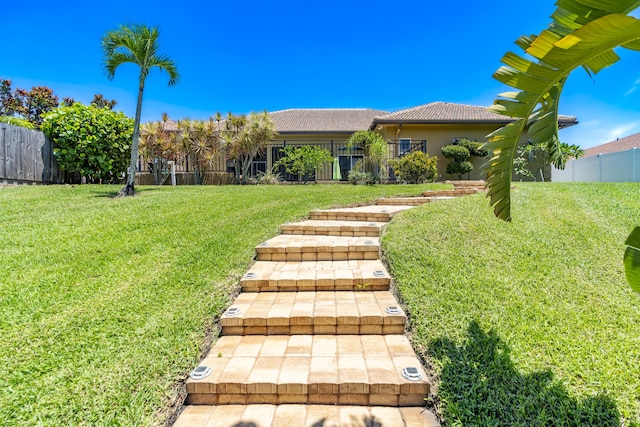 401 SE Verada Ave, Port Saint Lucie, FL 34983 - view of front of home with stucco siding and a tile roof