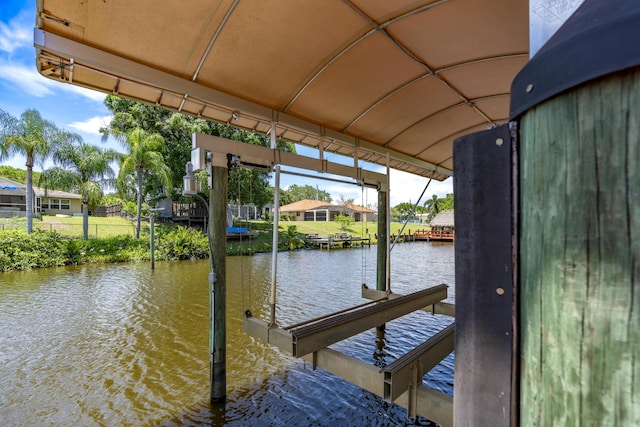 401 SE Verada Ave, Port Saint Lucie, FL 34983 - dock area with a water view and a residential view