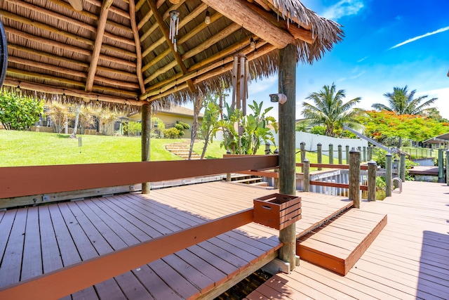 401 SE Verada Ave, Port Saint Lucie, FL 34983 - wooden terrace featuring a yard