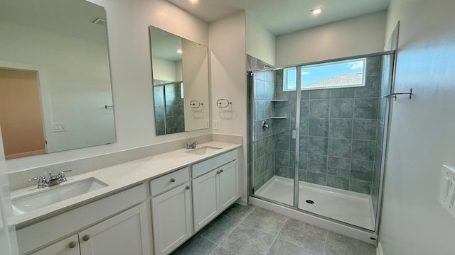 6159 Peaceful Park Way, Clermont, FL 34714 - full bath featuring a shower stall, double vanity, and tile patterned flooring