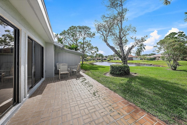 6170 Brandon St, Palm Beach Gardens, FL 33418 - view of patio featuring a water view