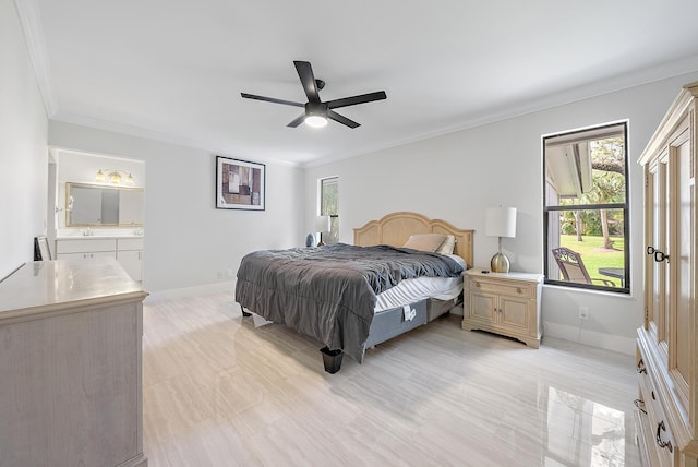 6170 Brandon St, Palm Beach Gardens, FL 33418 - bedroom with baseboards, ornamental molding, ceiling fan, ensuite bathroom, and a sink
