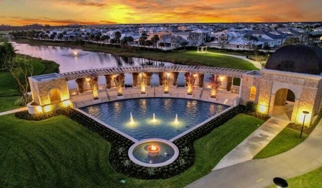 10710 Stellar Cir Unit 03, Palm Beach Gardens, FL 33412 - view of swimming pool with a water view