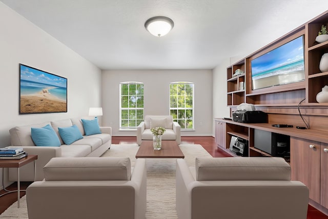 6057 Ridgelake Cir, Vero Beach, FL 32967 - living room featuring wood finished floors and baseboards
