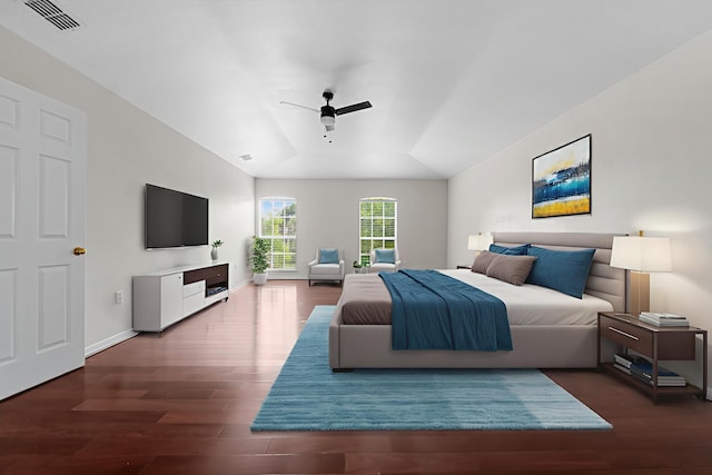 6057 Ridgelake Cir, Vero Beach, FL 32967 - bedroom featuring wood finished floors, ceiling fan, and baseboards