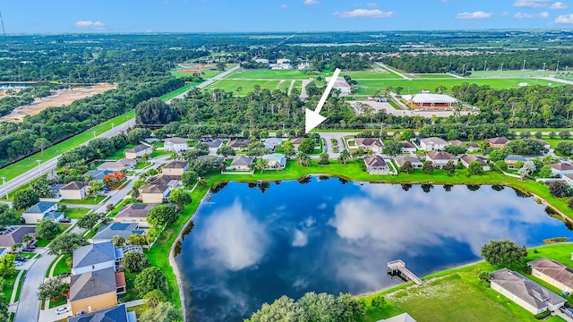 6057 Ridgelake Cir, Vero Beach, FL 32967 - aerial perspective of suburban area with a nearby body of water