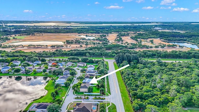 6057 Ridgelake Cir, Vero Beach, FL 32967 - aerial view of residential area featuring a nearby body of water