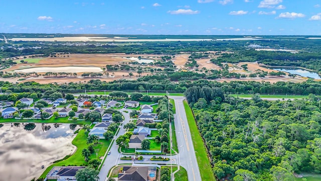 6057 Ridgelake Cir, Vero Beach, FL 32967 - aerial perspective of suburban area with a nearby body of water