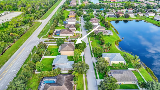 6057 Ridgelake Cir, Vero Beach, FL 32967 - aerial perspective of suburban area with a nearby body of water