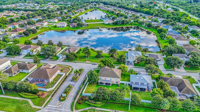 6057 Ridgelake Cir, Vero Beach, FL 32967 - aerial perspective of suburban area with a nearby body of water