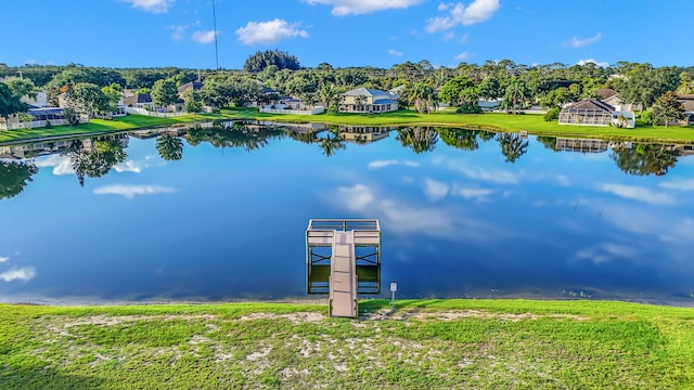 6057 Ridgelake Cir, Vero Beach, FL 32967 - dock area with a water view and a residential view