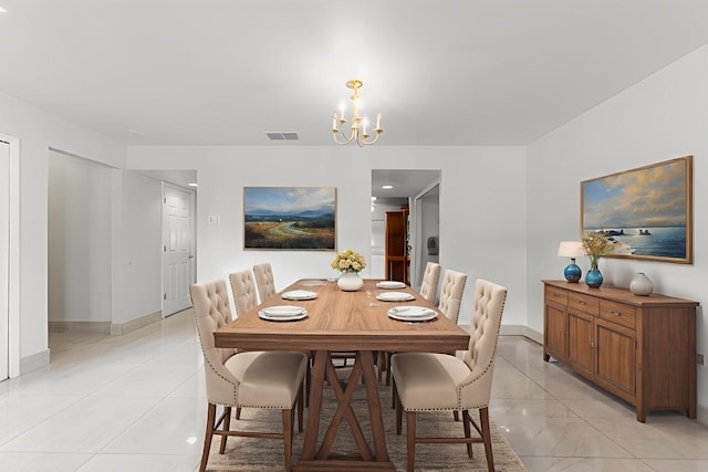 6057 Ridgelake Cir, Vero Beach, FL 32967 - dining room with a chandelier and baseboards