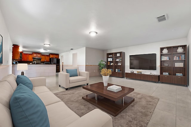 6057 Ridgelake Cir, Vero Beach, FL 32967 - living area with light tile patterned flooring