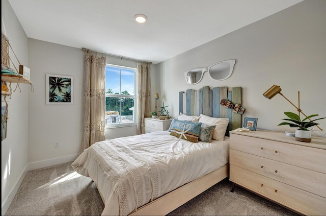 608 Waters Edge Ln Unit 2202, Port Saint Lucie, FL 34983 - carpeted bedroom featuring baseboards