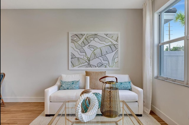 608 Waters Edge Ln Unit 2202, Port Saint Lucie, FL 34983 - living area featuring baseboards and wood finished floors