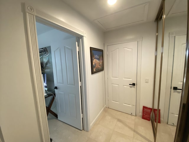 9124 Sun Terrace Cir Unit D, West Palm Beach, FL 33403 - corridor featuring baseboards and light tile patterned flooring