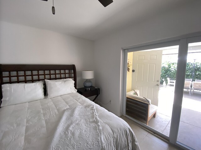 9124 Sun Terrace Cir Unit D, West Palm Beach, FL 33403 - tiled bedroom with a ceiling fan and access to exterior