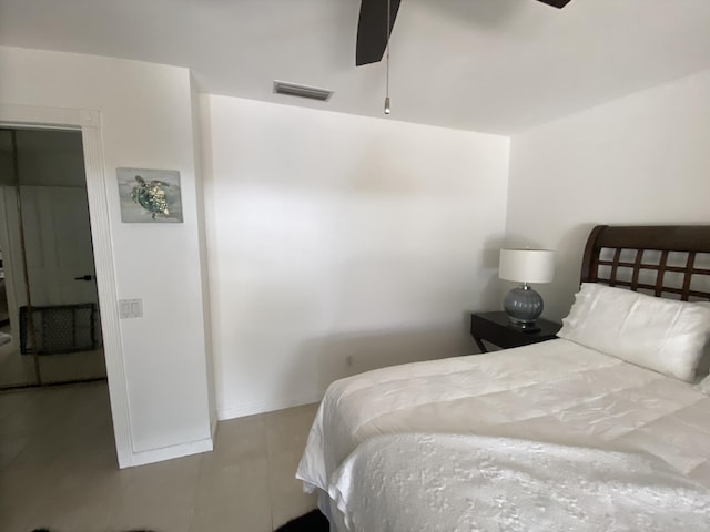 9124 Sun Terrace Cir Unit D, West Palm Beach, FL 33403 - bedroom featuring ceiling fan and tile patterned floors