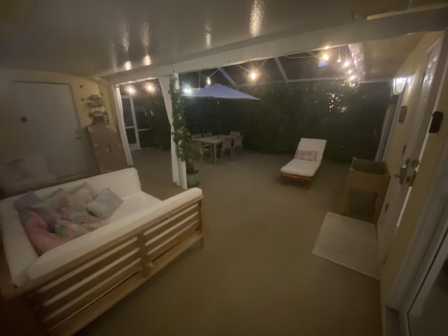 9124 Sun Terrace Cir Unit D, West Palm Beach, FL 33403 - patio at night with an outdoor living space, outdoor dining area, and a patio area