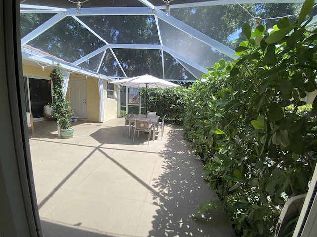 9124 Sun Terrace Cir Unit D, West Palm Beach, FL 33403 - view of patio / terrace with outdoor dining space and a lanai