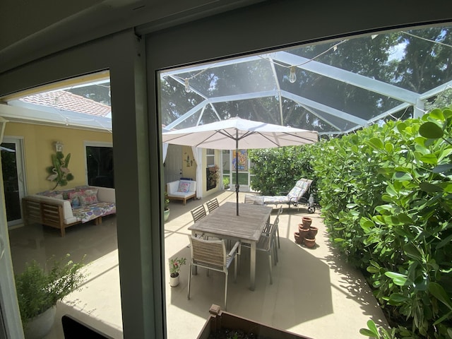 9124 Sun Terrace Cir Unit D, West Palm Beach, FL 33403 - view of patio / terrace featuring glass enclosure and outdoor dining space