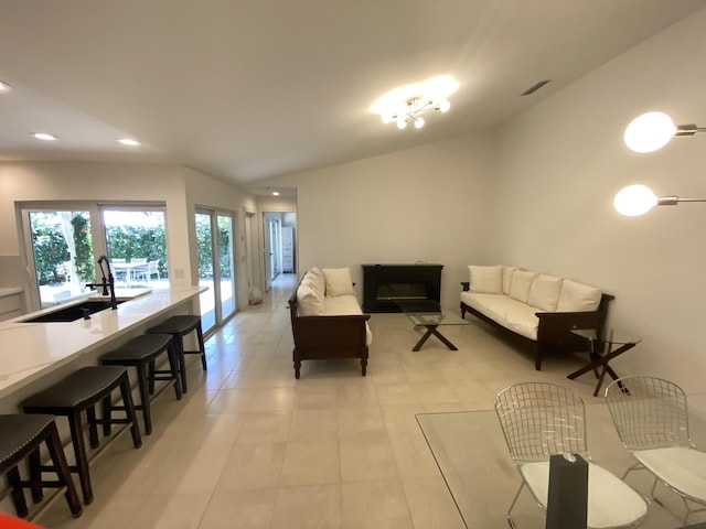 9124 Sun Terrace Cir Unit D, West Palm Beach, FL 33403 - living area with recessed lighting, vaulted ceiling, french doors, and light tile patterned floors