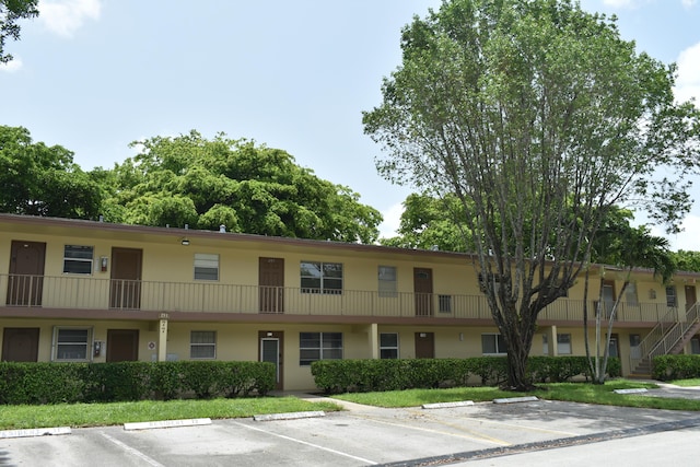 251 NW 76th Ave Unit 105, Margate, FL 33063 - view of property with uncovered parking