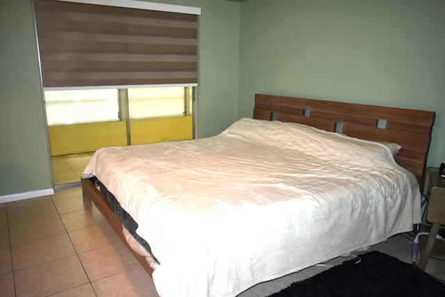251 NW 76th Ave Unit 105, Margate, FL 33063 - bedroom featuring tile patterned flooring