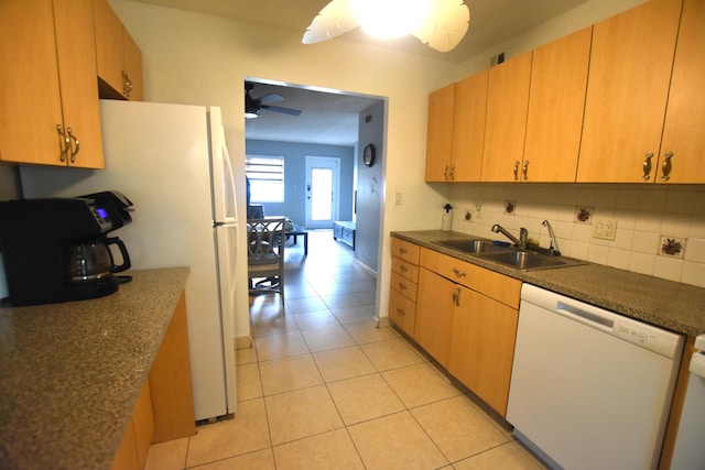 251 NW 76th Ave Unit 105, Margate, FL 33063 - kitchen featuring white appliances, a sink, ceiling fan, light tile patterned floors, and decorative backsplash