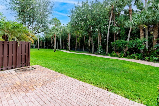 2812 Eagle Rock Cir Unit 902, West Palm Beach, FL 33411 - view of yard featuring a patio