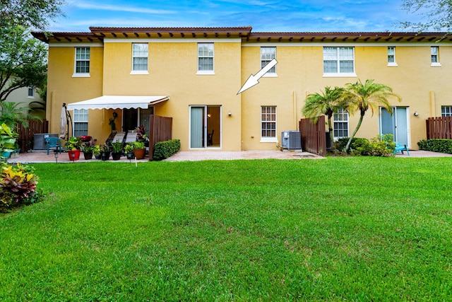 2812 Eagle Rock Cir Unit 902, West Palm Beach, FL 33411 - back of house with stucco siding and a patio