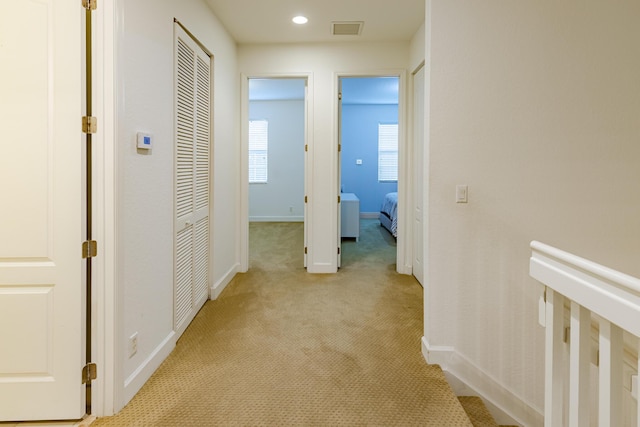 2812 Eagle Rock Cir Unit 902, West Palm Beach, FL 33411 - hallway featuring light carpet and recessed lighting