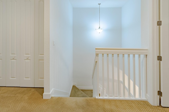 2812 Eagle Rock Cir Unit 902, West Palm Beach, FL 33411 - hall with carpet flooring and an upstairs landing