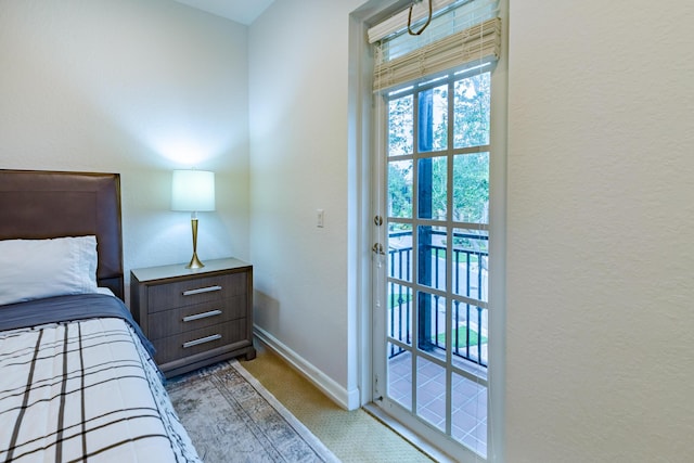 2812 Eagle Rock Cir Unit 902, West Palm Beach, FL 33411 - carpeted bedroom featuring baseboards and a textured wall