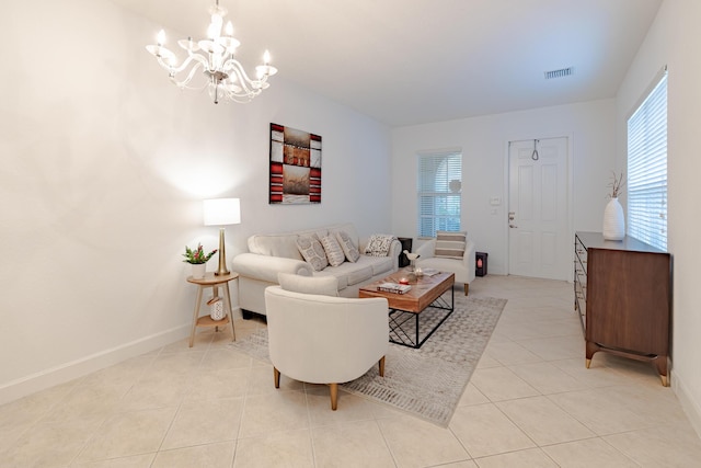 2812 Eagle Rock Cir Unit 902, West Palm Beach, FL 33411 - living area with a chandelier, plenty of natural light, and light tile patterned flooring