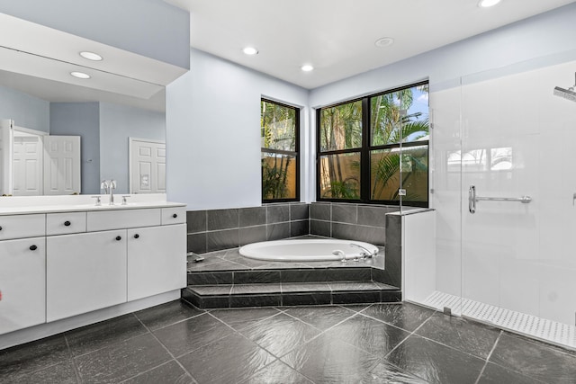 3049 NW 61st St, Boca Raton, FL 33496 - bathroom featuring vanity, a garden tub, a shower stall, and recessed lighting