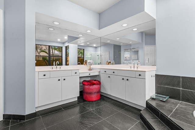3049 NW 61st St, Boca Raton, FL 33496 - full bathroom with two vanities, recessed lighting, and granite floors